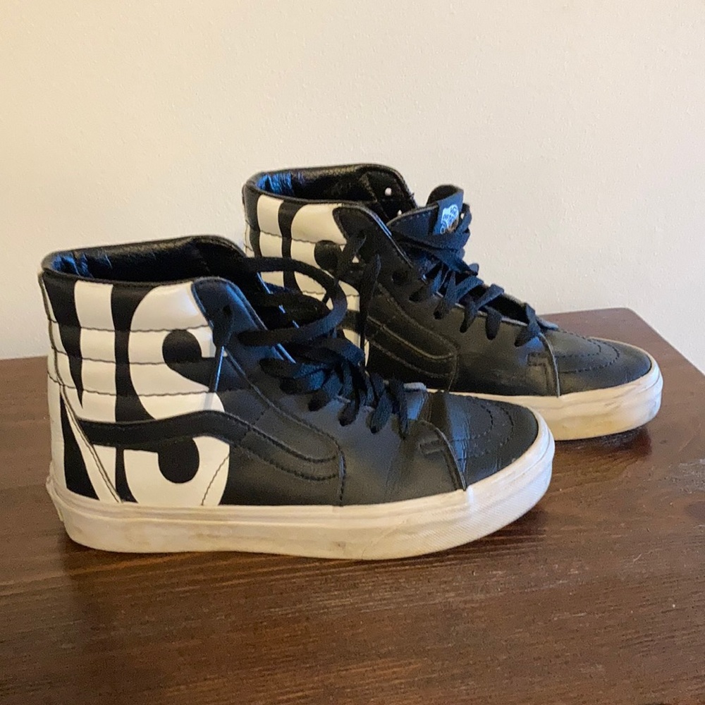 COPY - Vans black and white off the wall high tops.